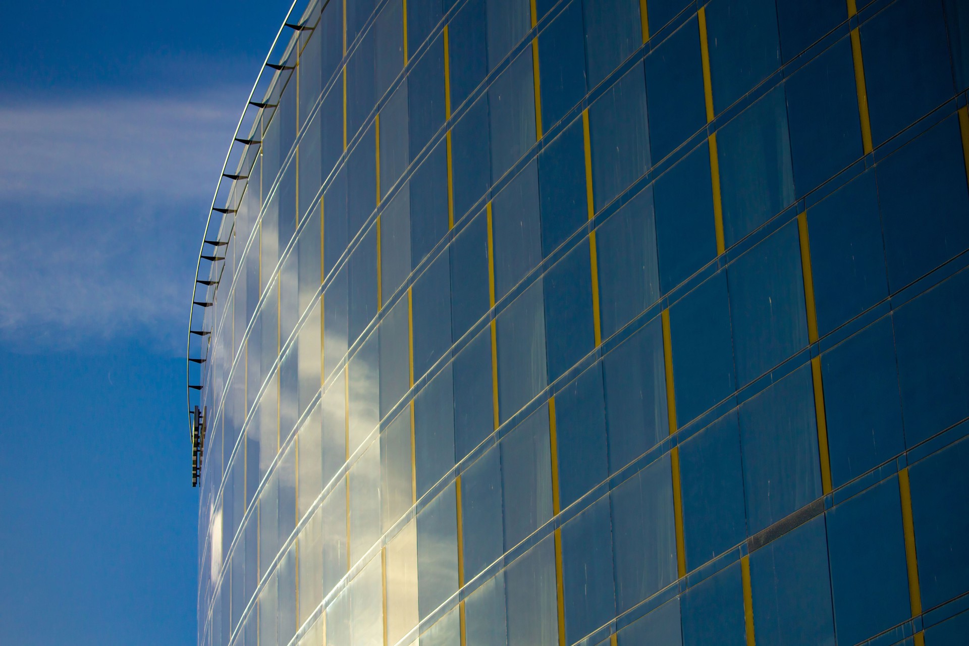 Perspective view of modern futuristic glass building abstract background.